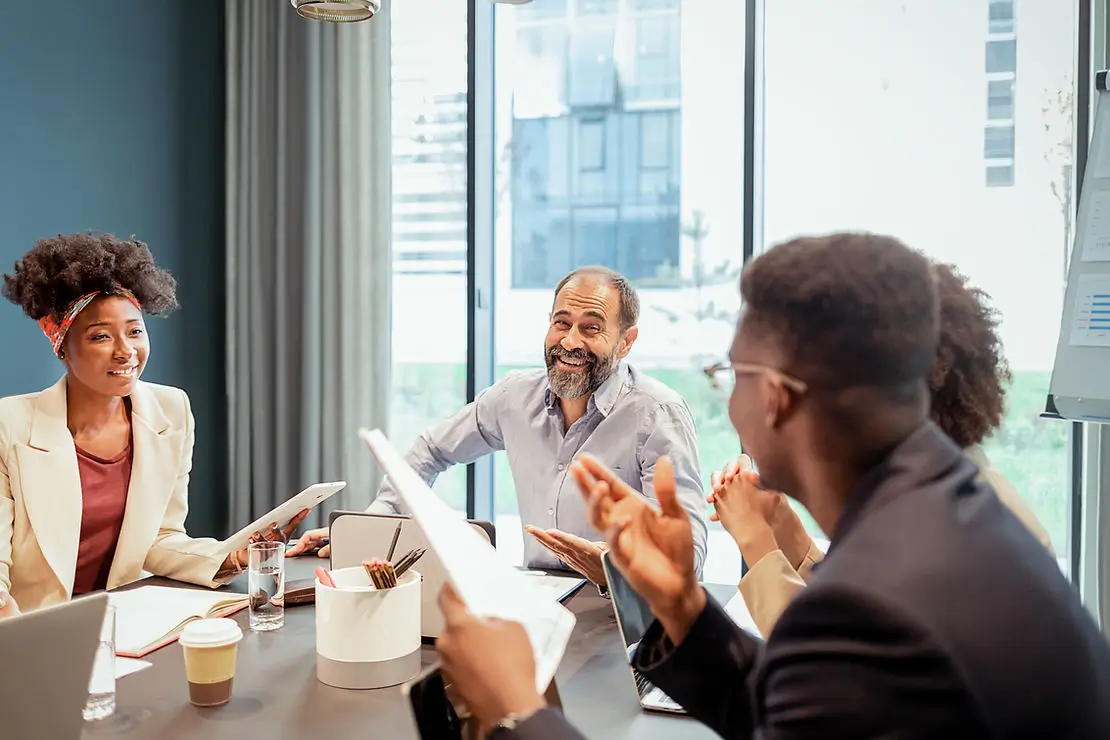 Group of coworkers at a table during a business meeting