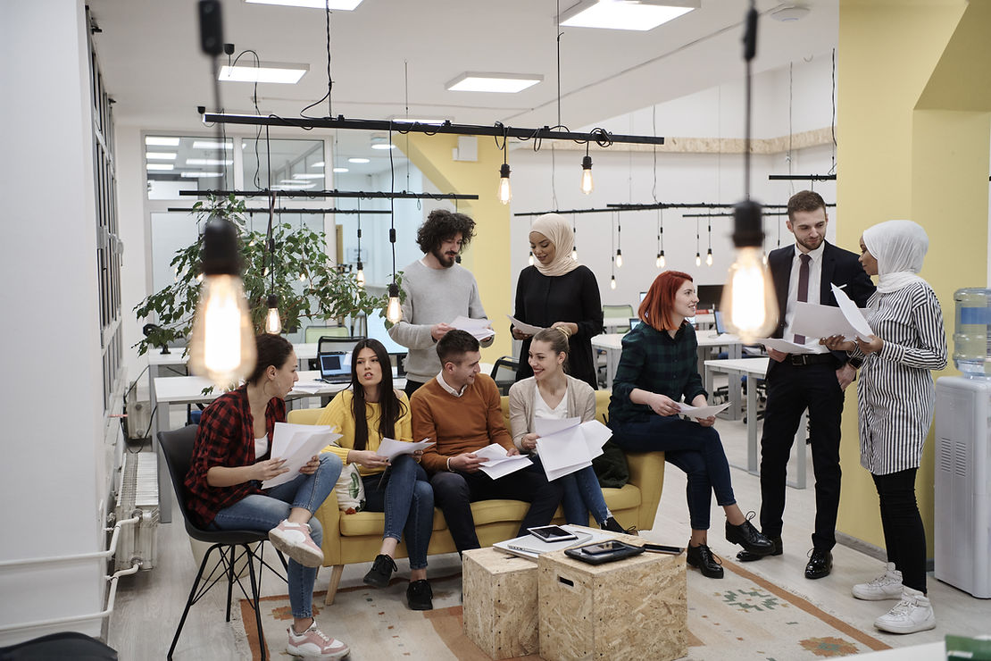 Group of coworkers in an office space working together