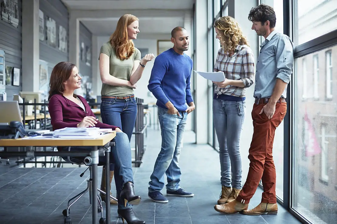 Group of people standing and talking