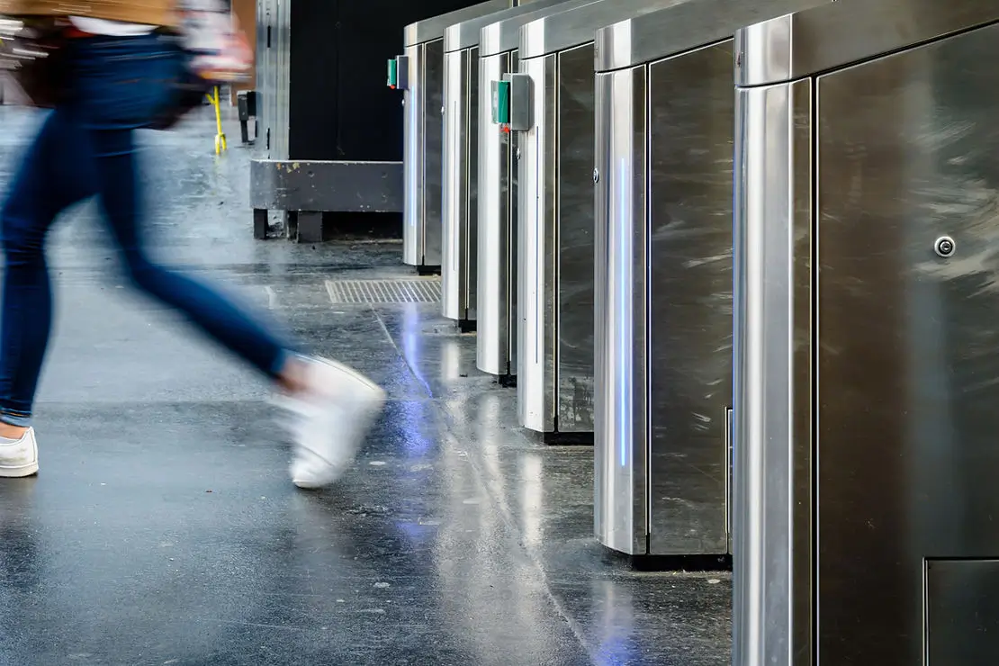 Person leaving a train station